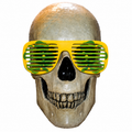 Green and yellow shamrock shutter glasses centered on a 12 Foot Skeleton head