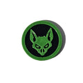 Green and black bat face Halloween token on pure white background